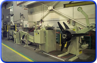 Conventional Coil Feed Line with Powered Straightener, Pull-Off Reel and ServoMax Servofeed.